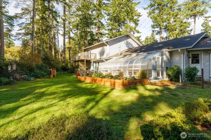 Huge yard is partially fenced
