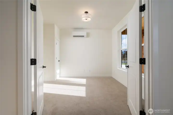 Main level den/office - Pics are of a different 2389 Kyler plan home. Features and colors may differ.