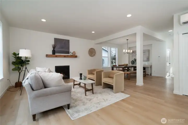 Great room and dining area - Pics are of a different 2389 Kyler plan home. Features and colors may differ.