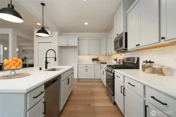 Kitchen - Pics are of a different 2389 Kyler plan home. Features and colors may differ.