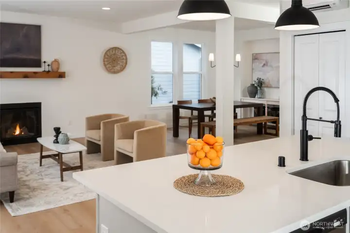 Kitchen and Great Room - Pics are of a different 2389 Kyler plan home. Features and colors may differ.