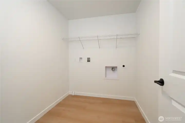 Upstairs Utility Room - Pics are of a different 2389 Kyler plan home. Features and colors may differ.