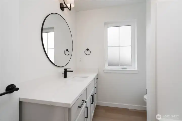 Upstairs Guest Bathroom - Pics are of a different 2389 Kyler plan home. Features and colors may differ.