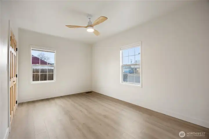 Two windows with custom blinds & new fan