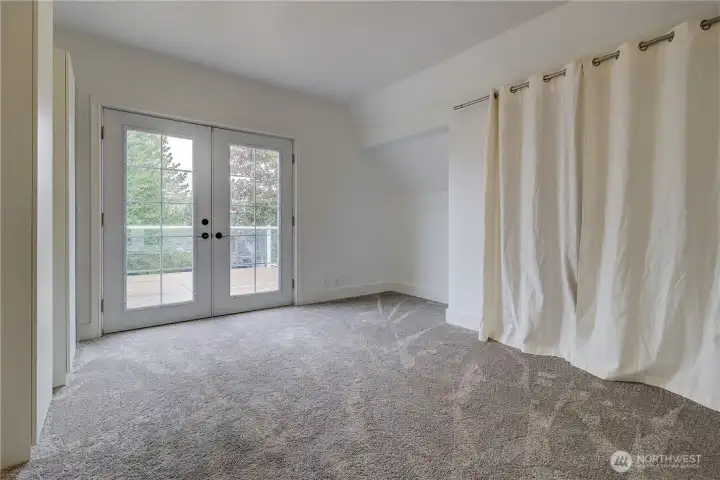 Bedroom with access to the deck.