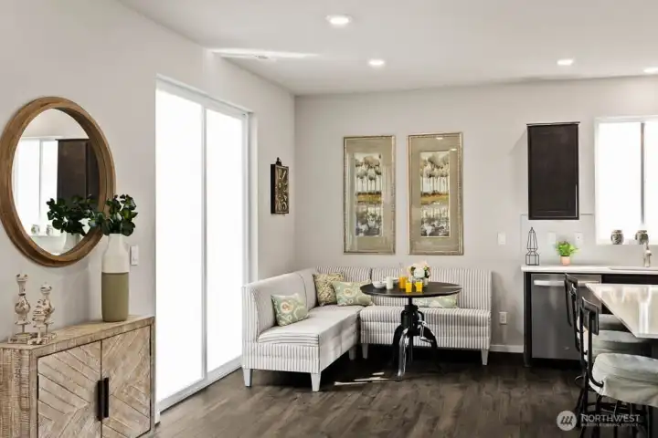 Informal breakfast nook off kitchen area. Photo is representational. Actual home is under construction. Colors, materials, and features may vary. See site agent for details.