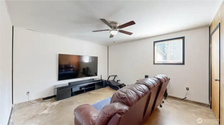 Family room offers flexible space for a media room, game room, home gym, or office.