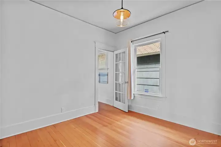 Back downstairs off the entry & dining room is the den