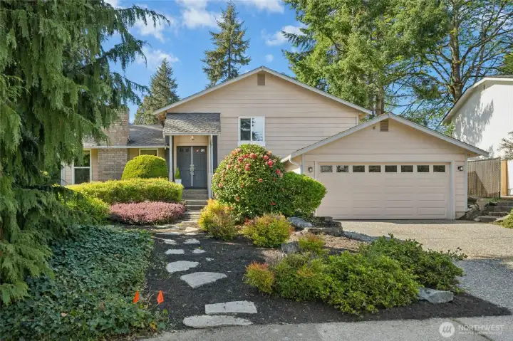 Clean, updated 4-bedroom, 3-bath tri-level home tucked away on a quiet dead-end street in one of the most desirable locations on sought-after South Finn Hill.