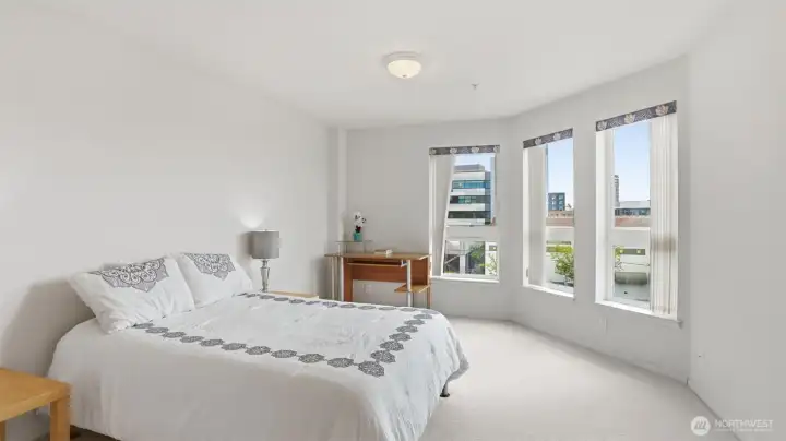 The primary suite features a full bath and walk-in closet