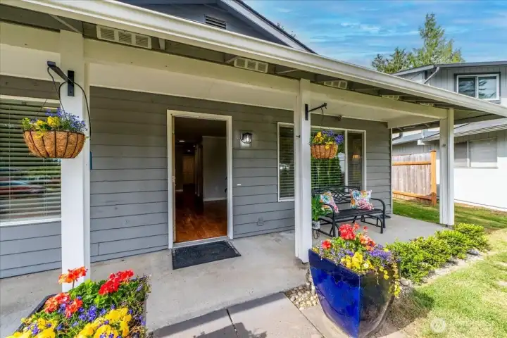 Enjoy morning coffee on your welcoming front porch