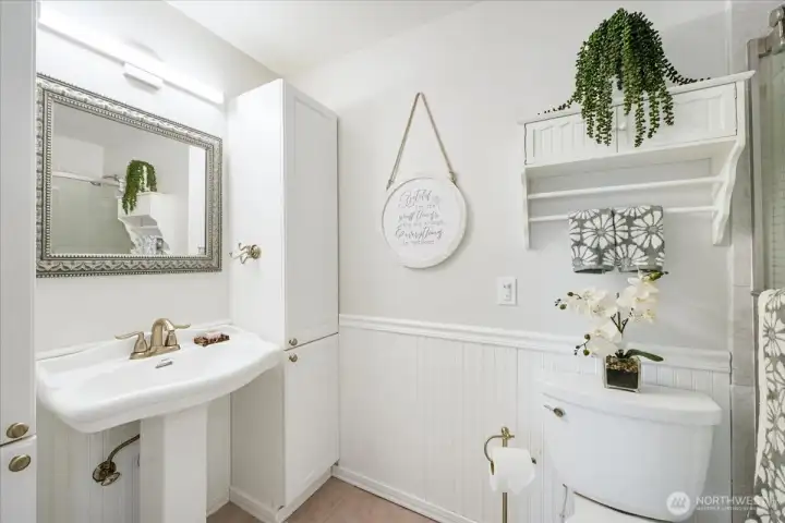 This bathroom is wheelchair accessible. The pocket door allow for full access.
