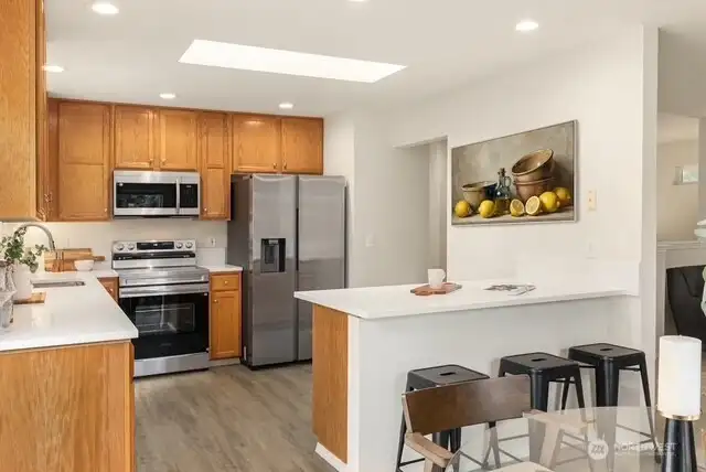 Entertainers delight! Skylight provides tons of natural light, kitchen with premium finishes, thoughtfully designed culinary kitchen blending functionality and style.
