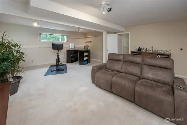 Family room with Wet Bar behind couch