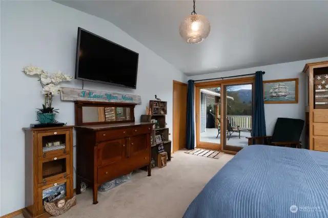 Primary bedroom with  doors to patio