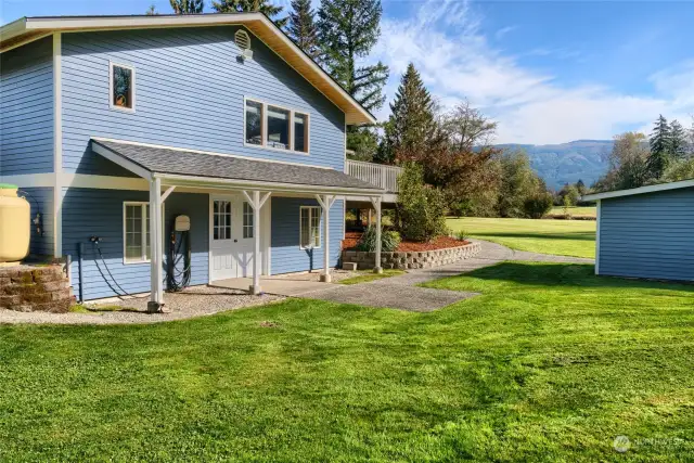 Back of the home showing entrance to bonus