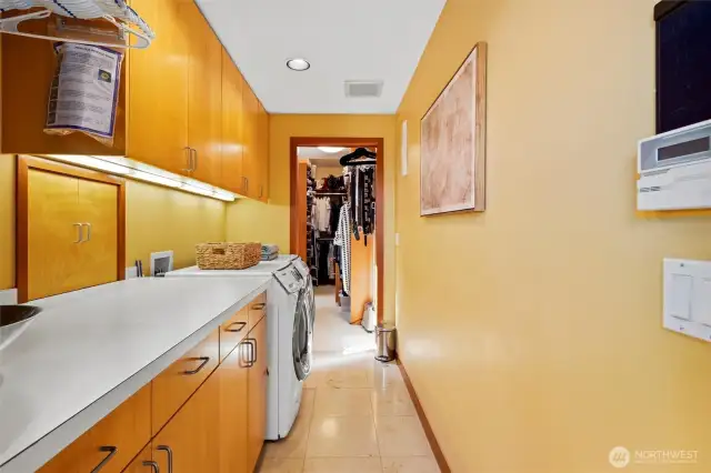 Utility room with primary bedroom access