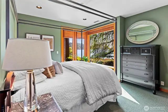 Lower level view bedroom with ensuite bathroom & patio access
