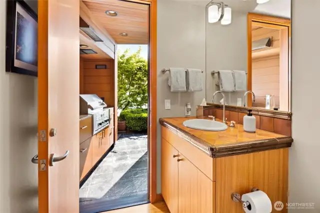 Half bath with easy access to patio.