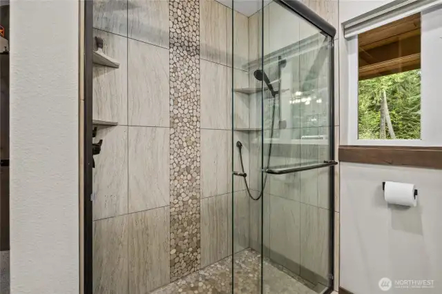 Custom walk in shower in primary bathroom