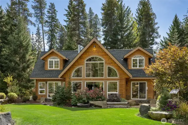 Enjoy the peaceful park like setting in the beautifully landscaped yard.