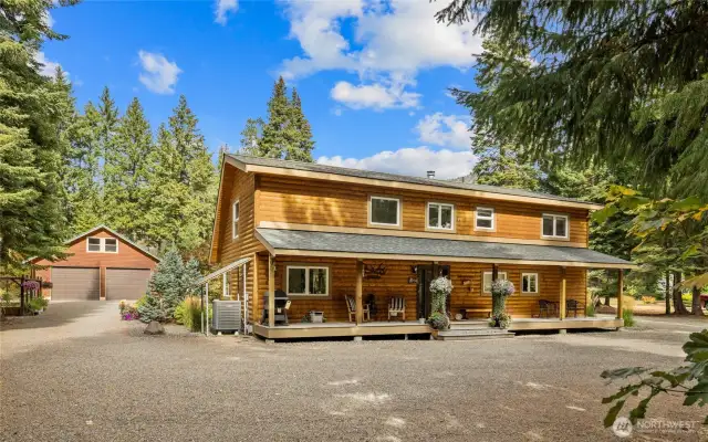 Covered back deck and main entrance to the home.
