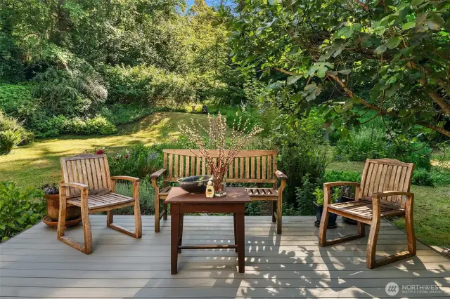 Inviting deck off the dining area. What a lovely spot for al fresco meals, surrounded by greenery and birdsong.