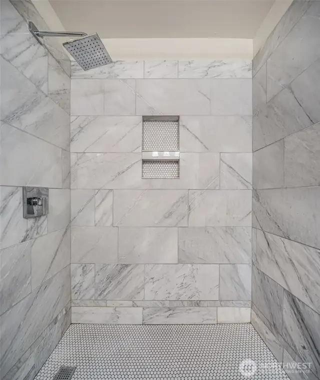 Custom marble tiled shower.