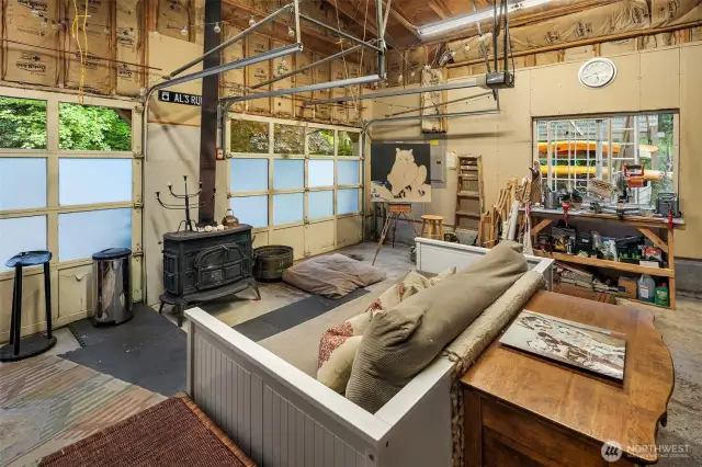 Wood stove warms this space in winter, A great maker's space.