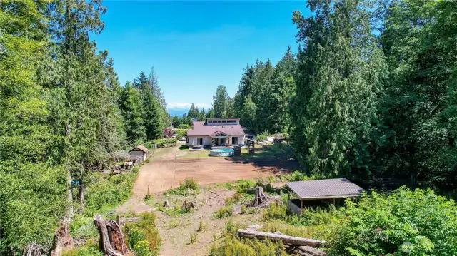Back yard has trails and horse pasture