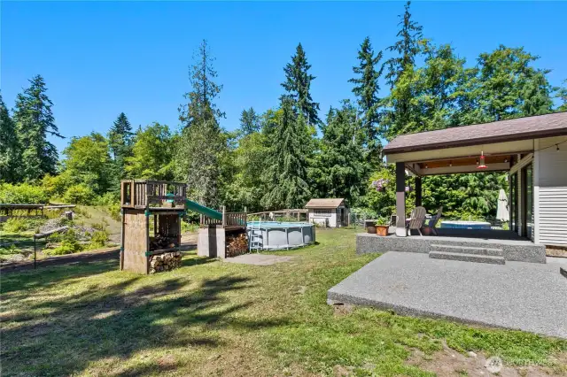 Back yard looks out to your forested pasture