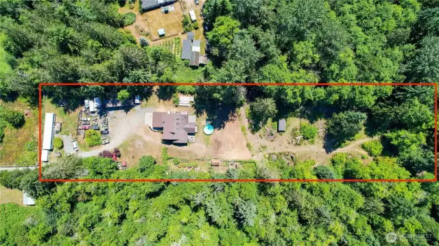 2.5 acres, pasture, chicken coop, garden, single wide, above ground pool and your seclusion!