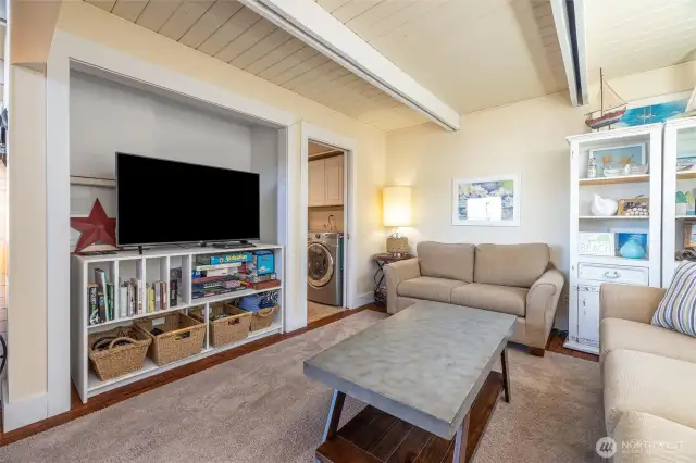 Reading nook off living room leads to laundry room & half bath.