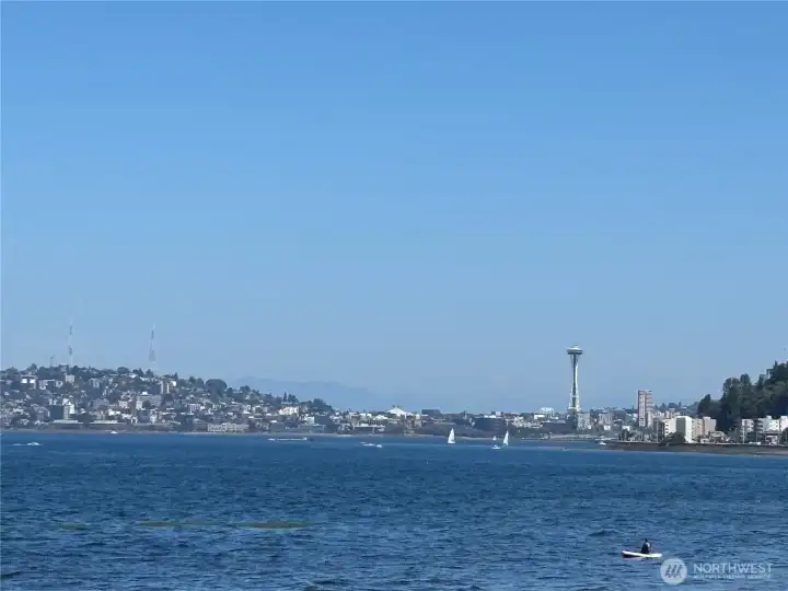 Views of the Space Needle from Alki Beach.
