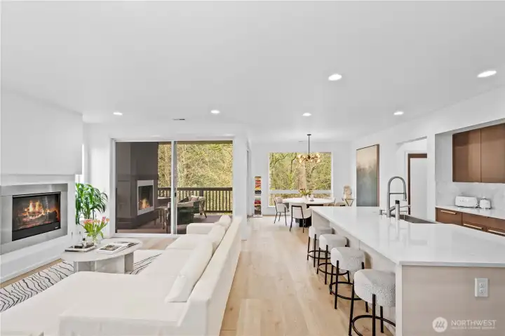 Welcome to your gorgeous open concept living and dining, backing to beautiful greenery!