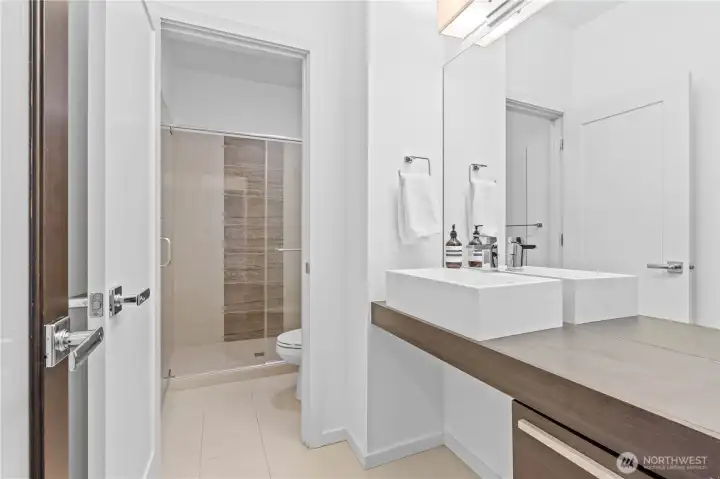 Three-quarter bath on main floor, perfect for guests in the next door room!