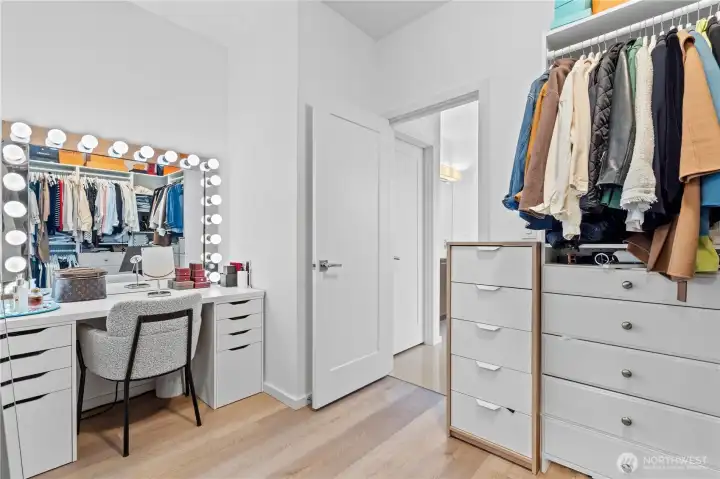 The walk-in closet of your dreams in the primary bedroom