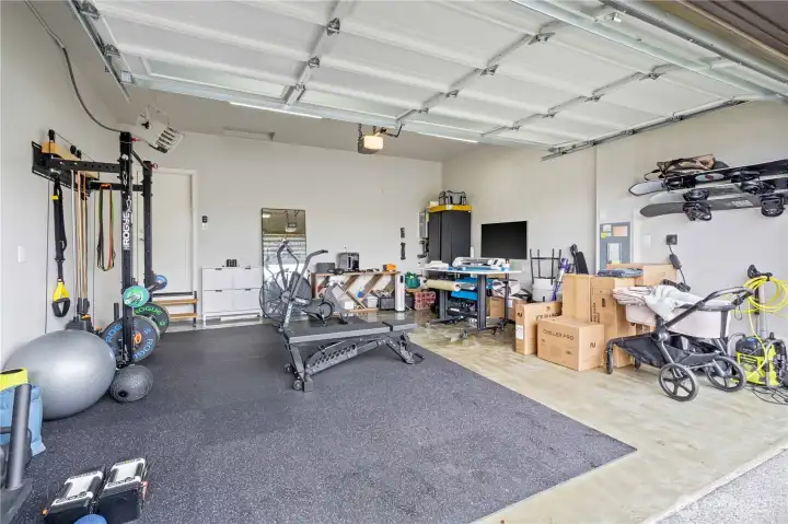 Large, clean garage and home includes an electric vehicle charger!