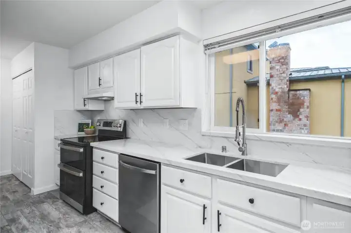 New dishwasher, laundry room is in the closet in the back.