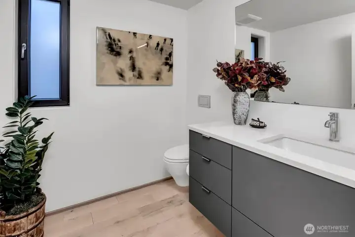 Powder Room off Kitchen & Living Room