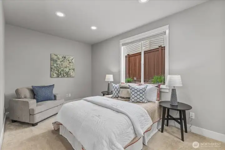 Guest Bedroom Downstairs - Ideal for guests, multigenerational living, or added flexibility.