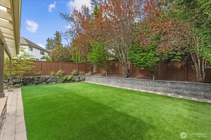 Private, low-maintenance turf creates the perfect backdrop for play, pets, and effortless outdoor enjoyment.