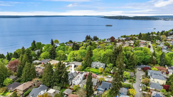 Delight in catching glimpses of Puget Sound and the snowy Olympic Mountains from several spots inside & outside of the home.