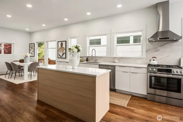 Large island prep space. New hood fan!