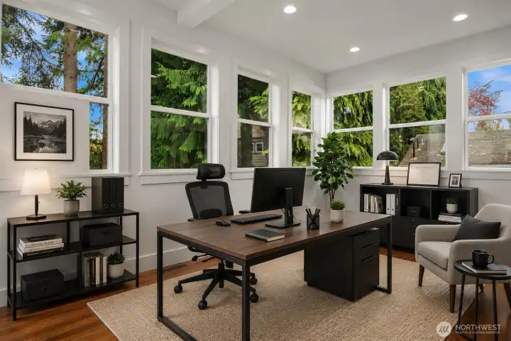 *virtually staged* sunroom shown as a home office.