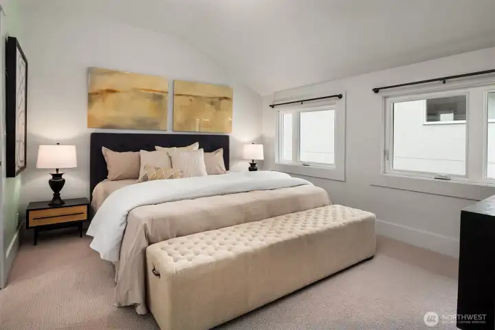 The primary suite bedroom fits a King sized bed and has a walk-in-closet.