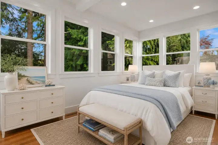 *virtually staged* sunroom shown as a guest bedroom.