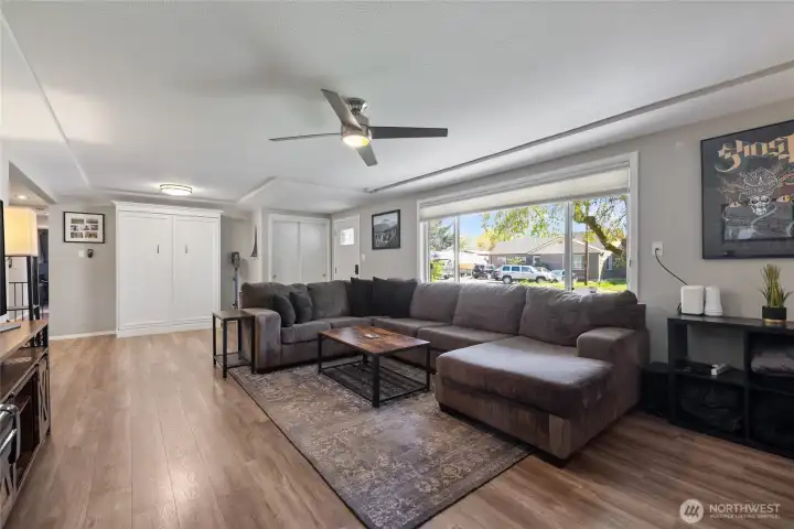 Large living area features a Murphy bed for over night guests