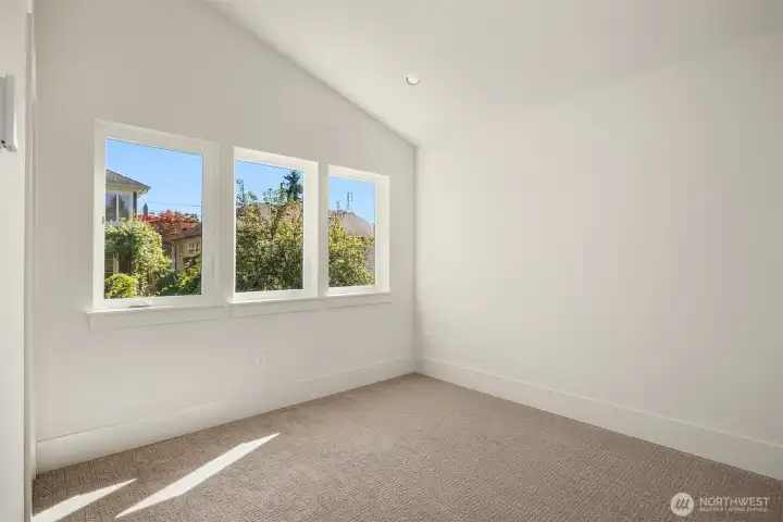 UPPER FLOOR BEDROOM WITH VAULTED CEILINGS