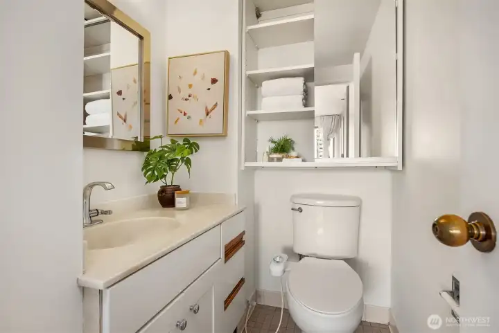 Ensuite half bath off of primary bedroom